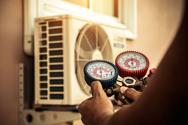 Professional Hvac technician working in Winchester, MO